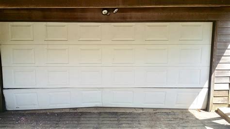 residential garage door panel replacement